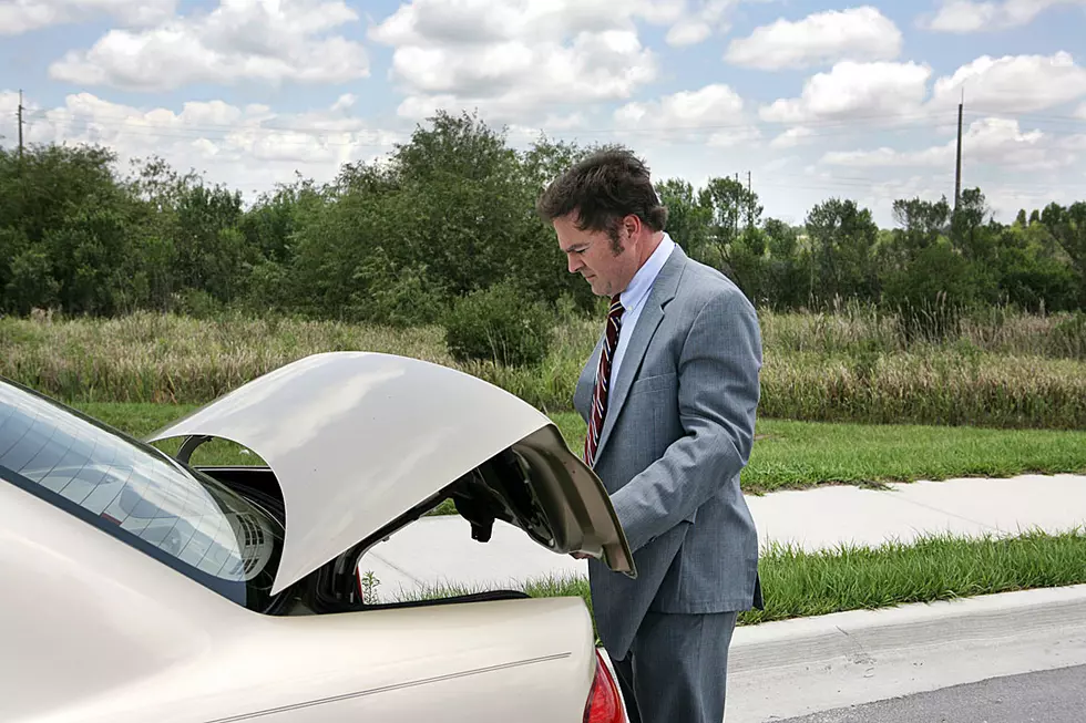 Drunk Dude Somehow Stays Asleep on Car Trunk During Insane 14-Mile Jaunt