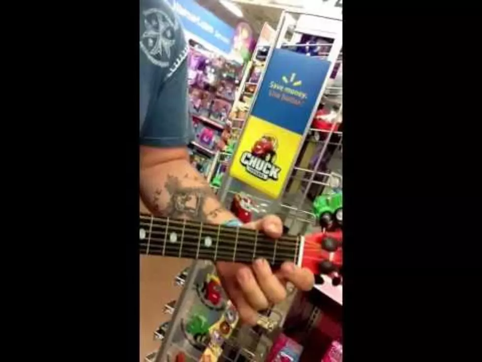 You Won’t Believe How This Guy Shreds On A Toy Guitar