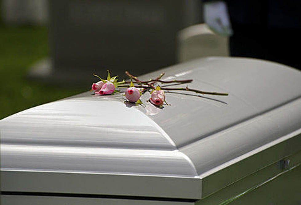 Mommy, Why Is There A Coffin On The Grass At School?