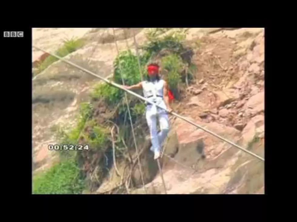 Tightrope Walker Survives Incredible Fall [VIDEO]