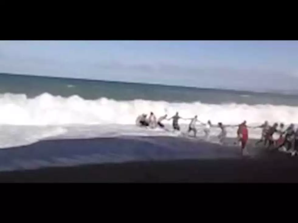 Amazing Video Shows Strangers Forming Human Chain to Save Drowning Boy