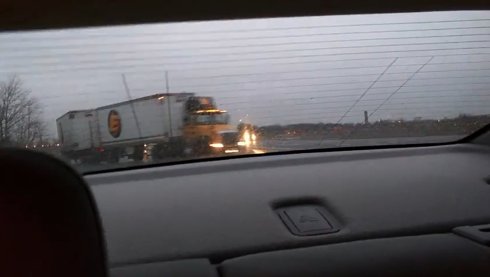 WATCH: Frightning Video of Truck Almost Hitting Car on Black Ice