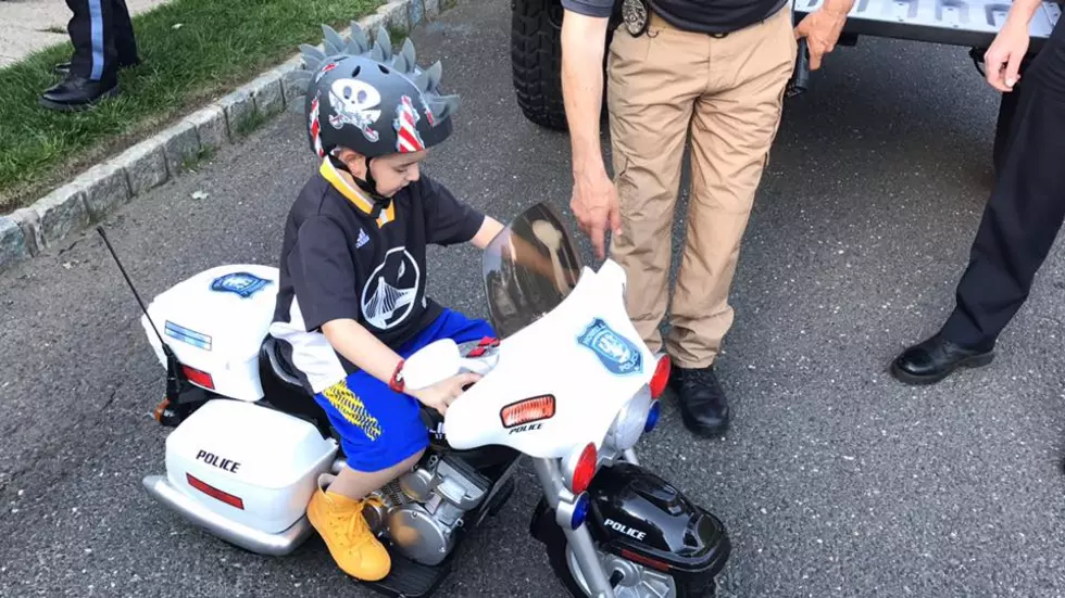 Howell Police Give Little Boy with Cancer a Motorcycle