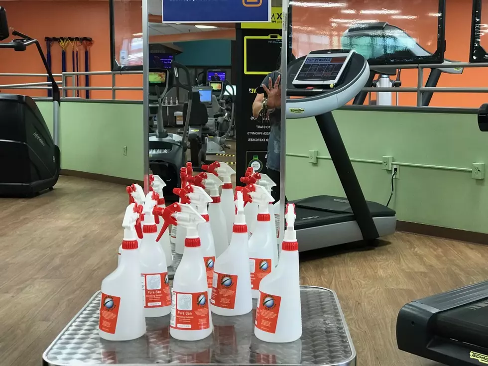 (Tons of sanitizer bottles will be available in every room in addition to the new air purification systems in each workout area. Photo by Liz Jeressi)