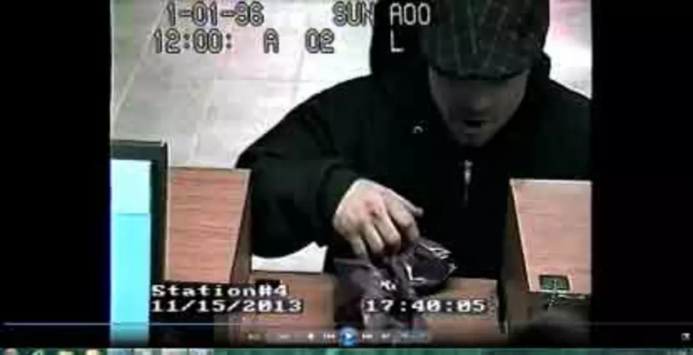 Robber Strikes a Brick Sovereign Bank