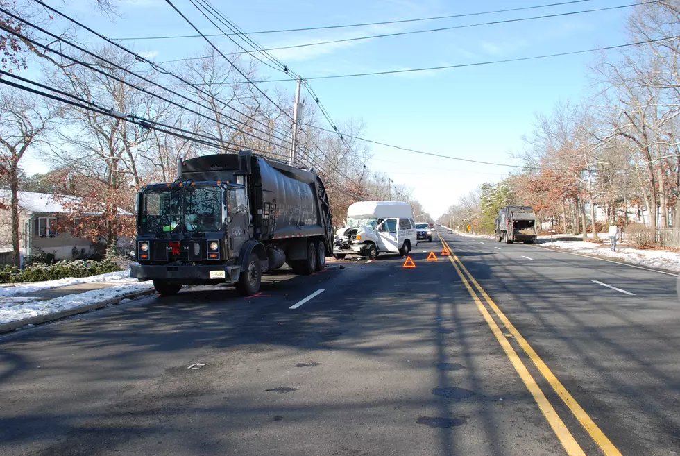 Two Hospitalized in Manchester After a Passenger Van Collides into a Garbage Truck