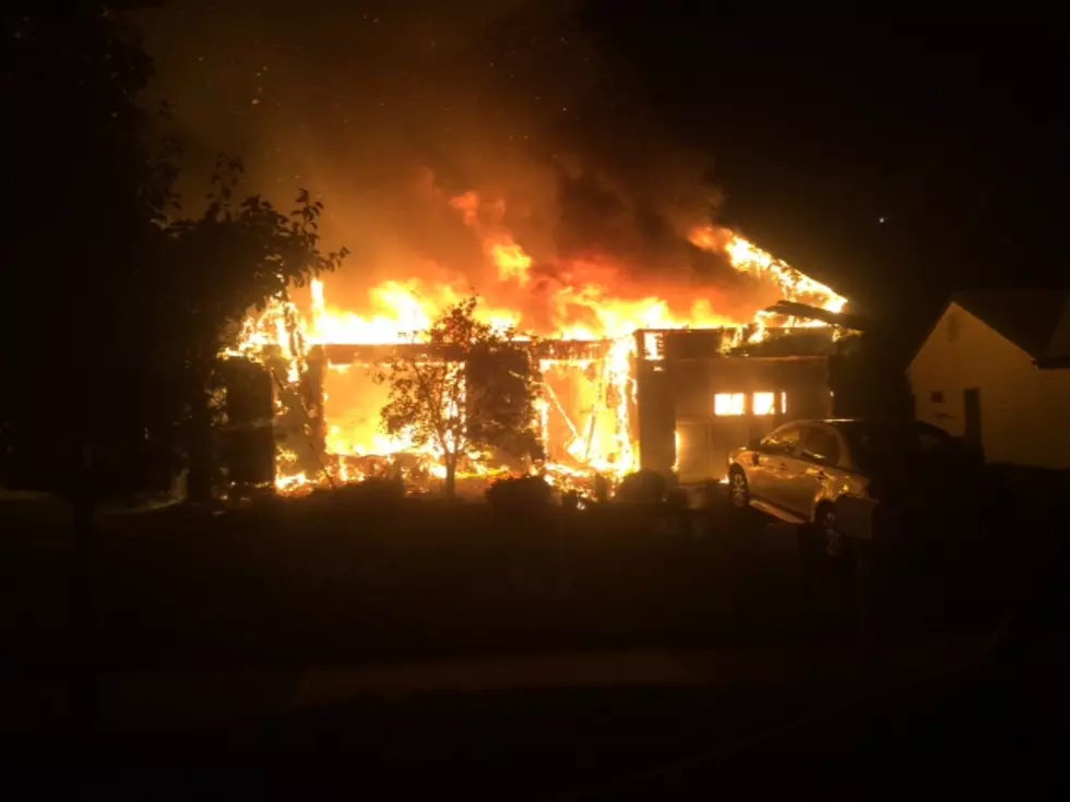 Manchester Woman Escapes House Fire