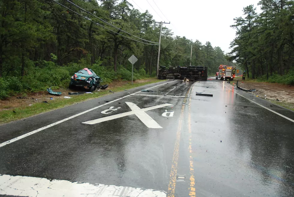 Car mangled, truck flips, drivers hurt in Manchester head-on