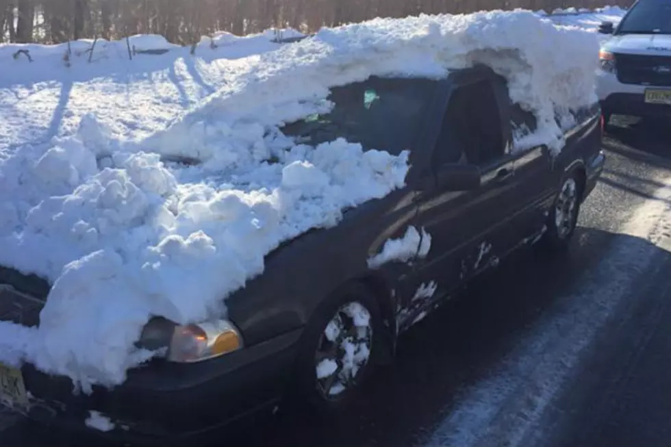Howell Police Help Driver With Nearly Three Feet of Snow Left on His Car