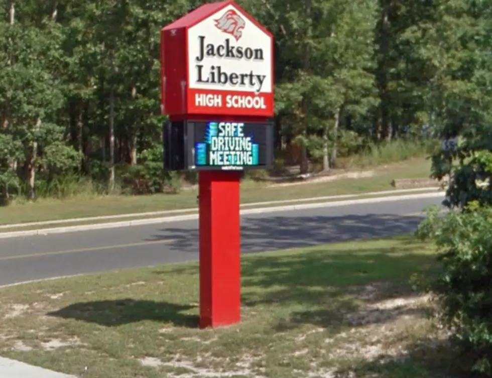 Police swarm to residence near Jackson Liberty High School