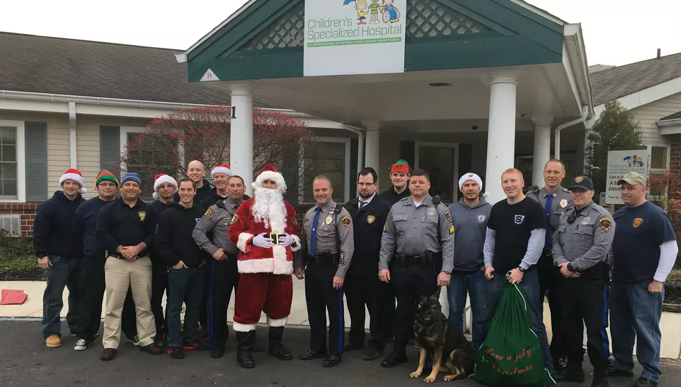 Santa brightens ailing children’s holiday, with help from Toms River police