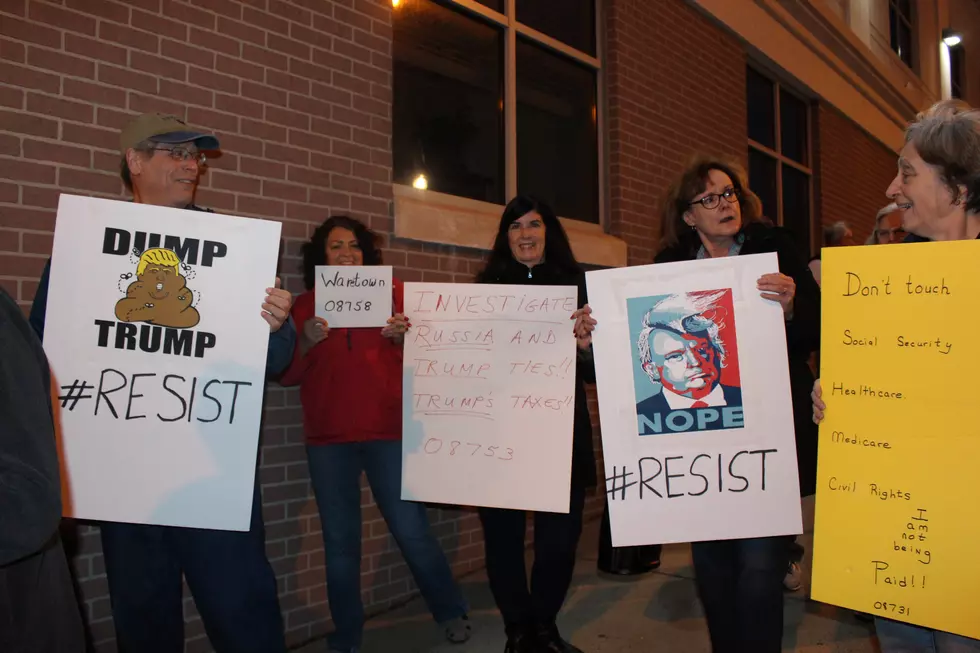 We’re not paid! — Protesters bring their message to NJ congressman’s radio show