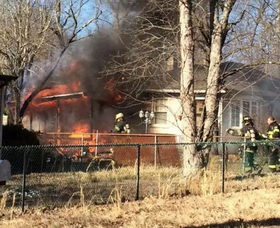 Howell firefighters battle house blaze, struggle against winds