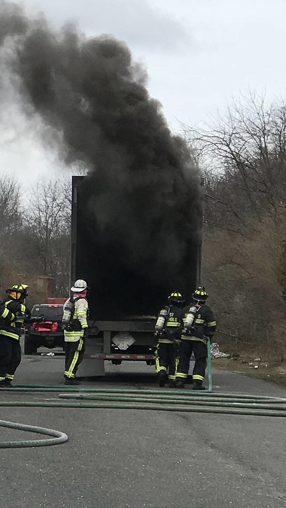 Tractor Trailer fills with black smoke Monday in Freehold