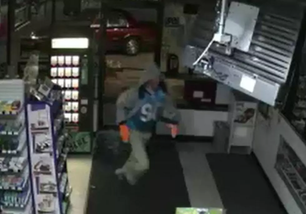 Medford Police looking for suspect who robbed business of Seven-Grand in cash