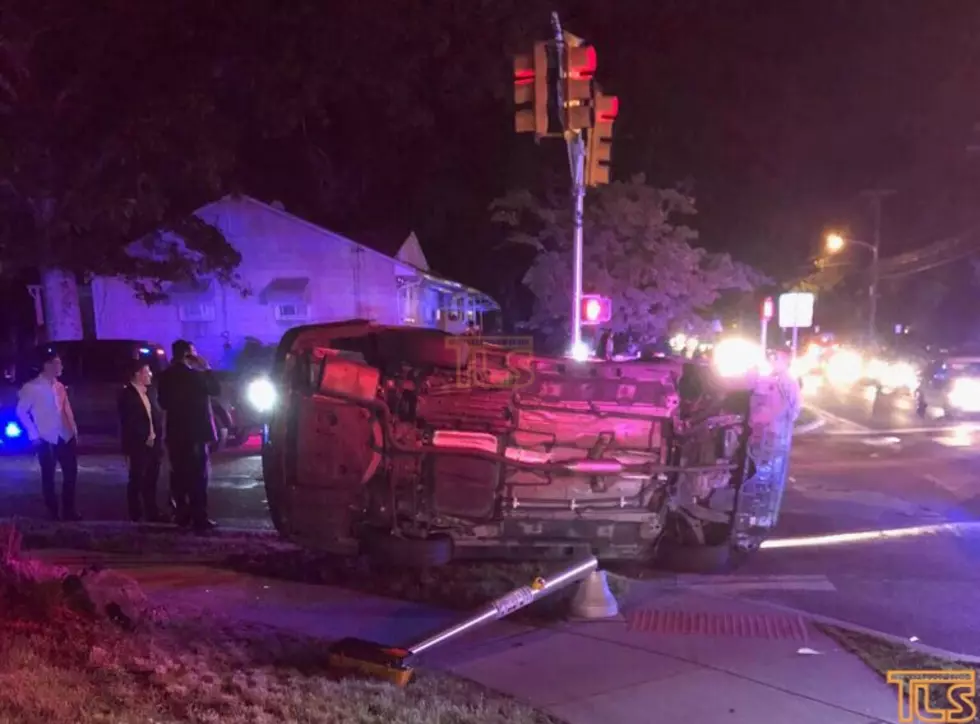 Lakewood man who ran a red light causes car to overturn