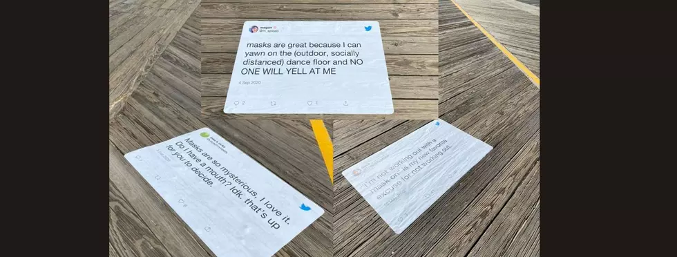 Posters of Tweets Advocating COVID-19 Safety Flood Shore Boardwalk