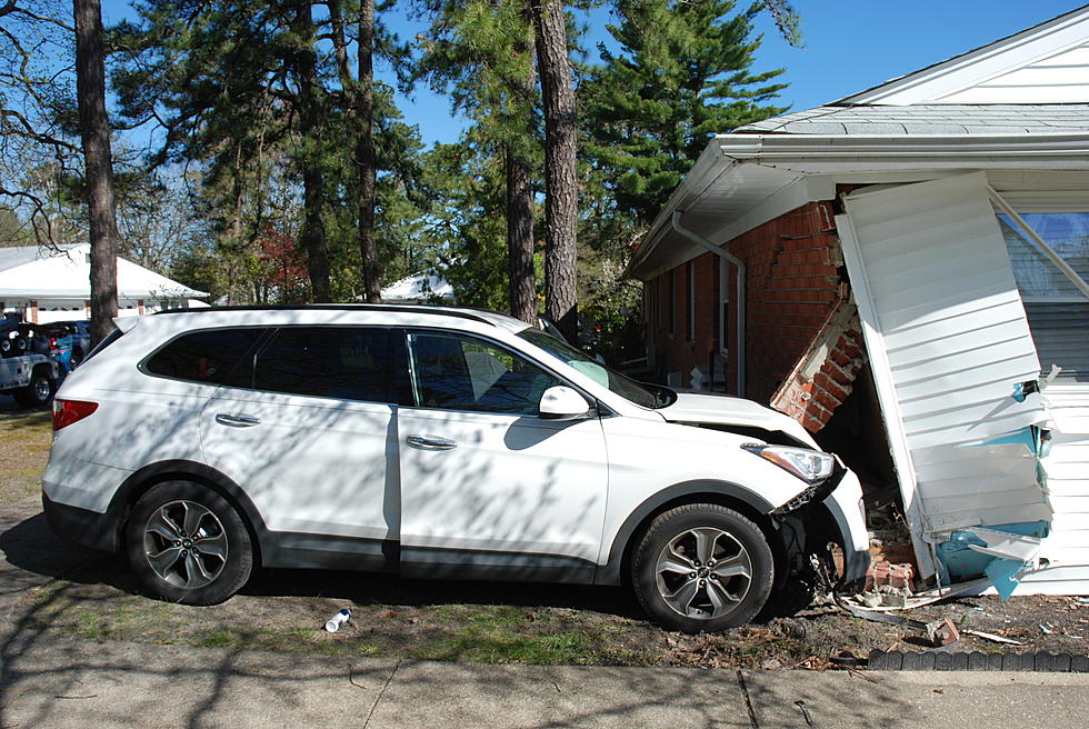 Manchester Police say medical episode may have caused car to crash into house