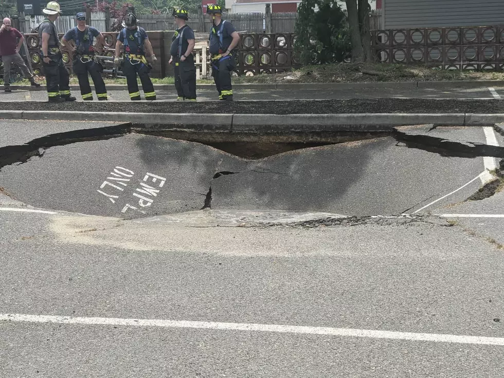 What caused a massive sinkhole to open up under investigation in Wall