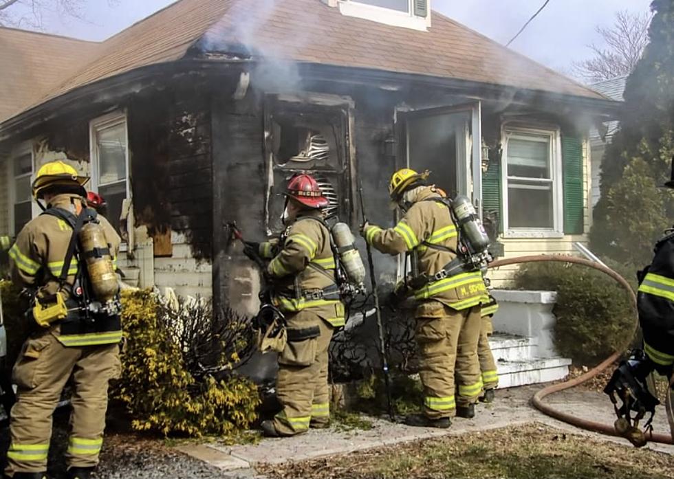 41-firefighters help put out flames emanating from a home in Middletown, NJ