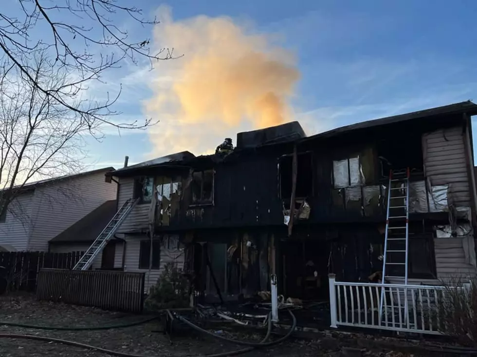 Fire spreads through two townhomes in Howell early Tuesday