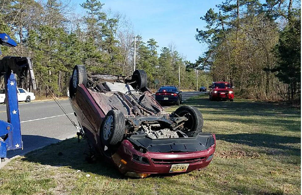 Car flips in Manchester crash, both drivers hospitalized