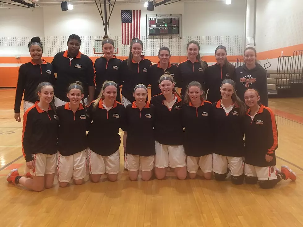 Cherokee High School Girls Basketball Team collecting new and used sneakers