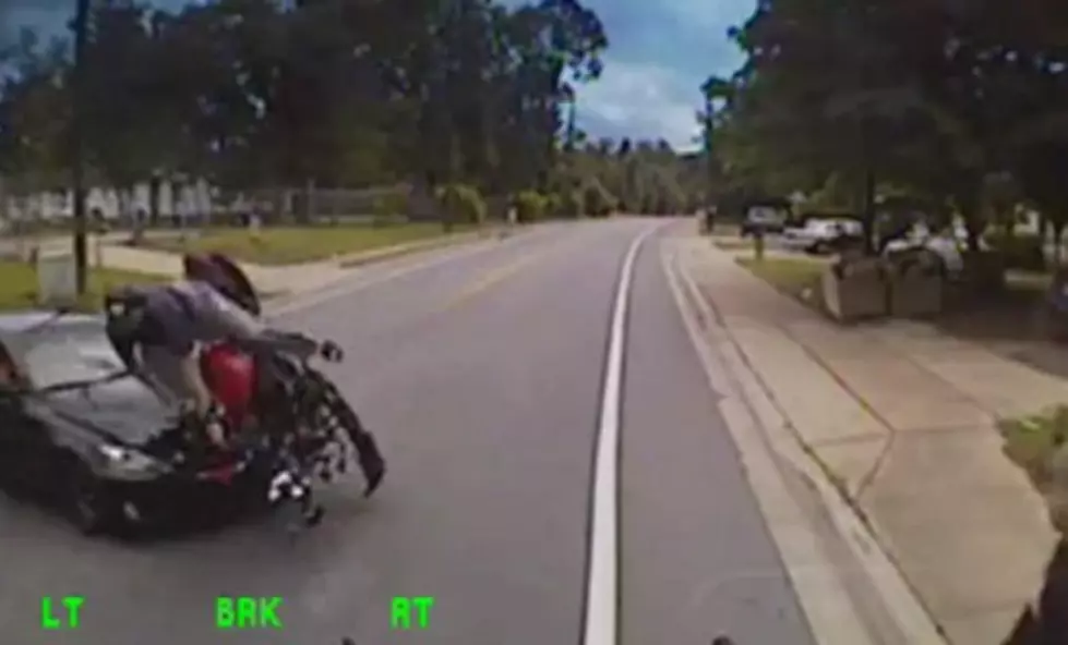 Guy Walks Away from Horrific Motorcycle Crash [VIDEO]
