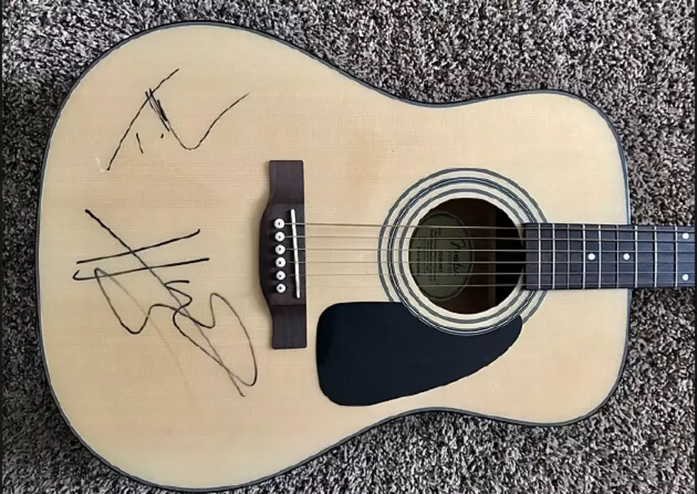 Tim McGraw and Hunter Hayes Autographed Guitar Up For Auction