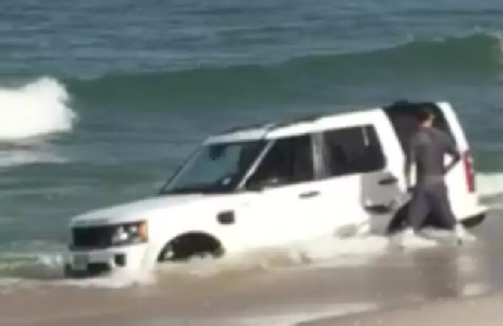 Idiot Learns How Not To Park Your Land Rover on The Beach [VIDEO]
