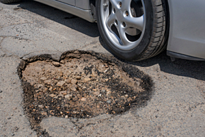You Have to Check Out This Christmas Tree Pothole [VIDEO]