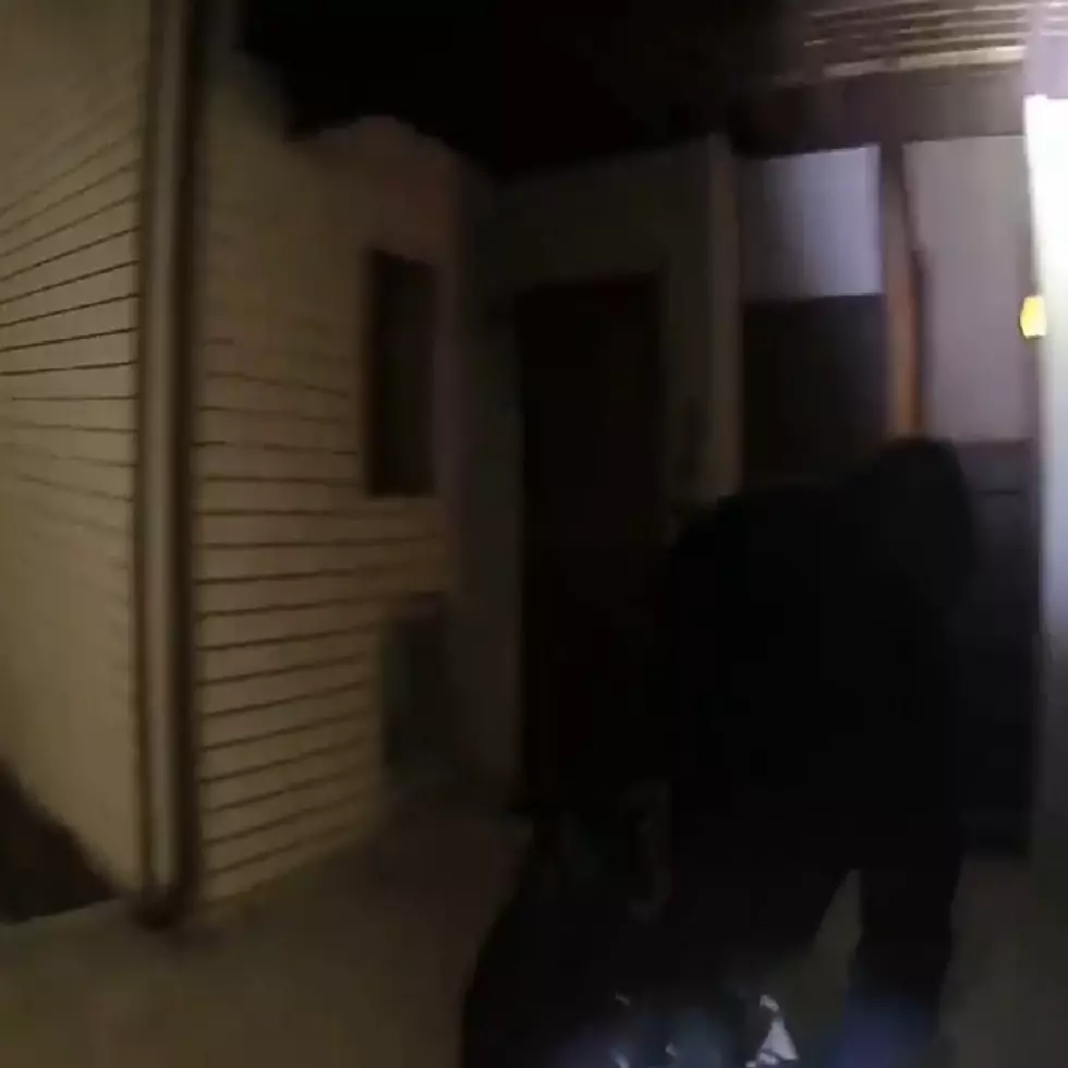 Watch Winslow Cop Pull Woman to Safety From Apartment Fire