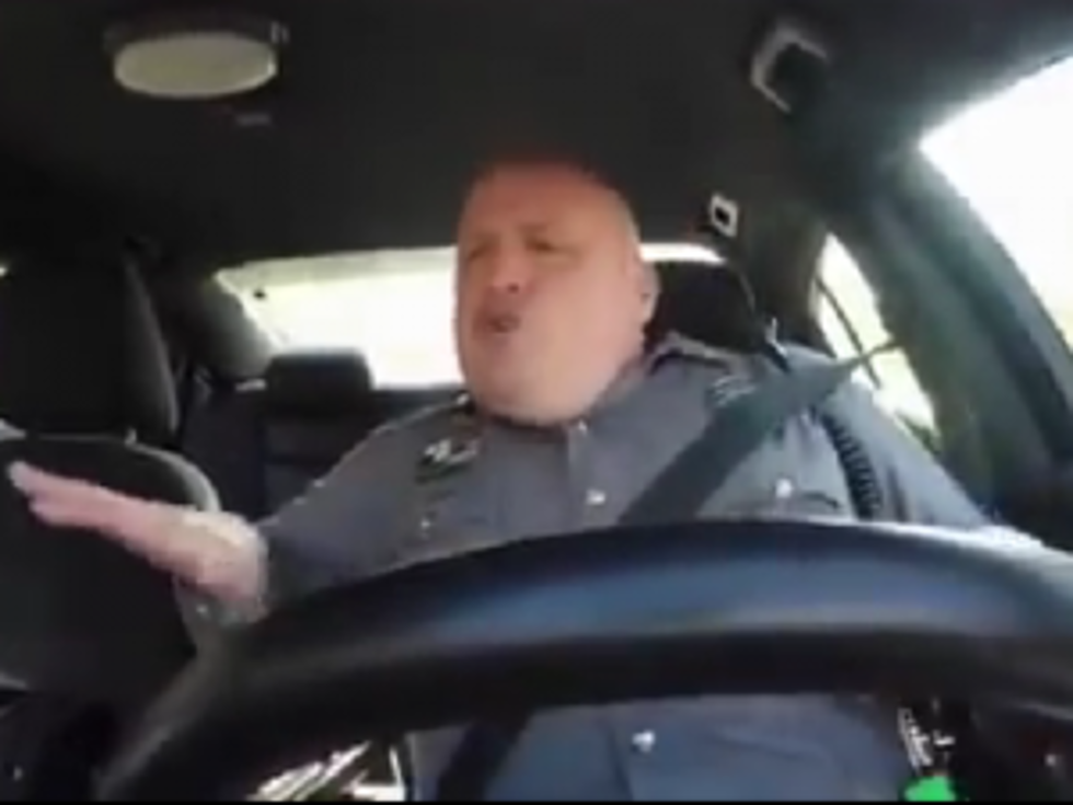 Cop Caught on Dash Cam Singing and Jamming toTaylor Swift [VIDEO]