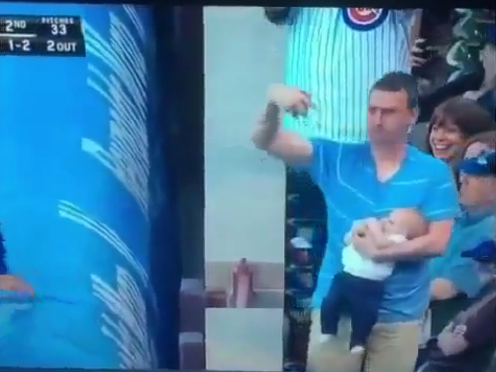 Dad Catches Foul Ball While Holding 7-Month-Old  [VIDEO]