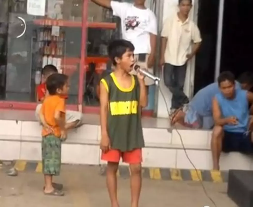 Jaw Dropping Rendition of Whitney Houston by Street Kid [VIDEO]