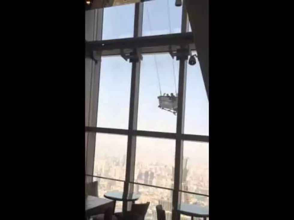 Workers on Window Washing Rig Get Blown Around by High Winds [VIDEO]
