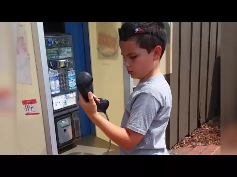 Adorable Kid Sees Payphone for the First Time and Has No Idea What it is [VIDEO]