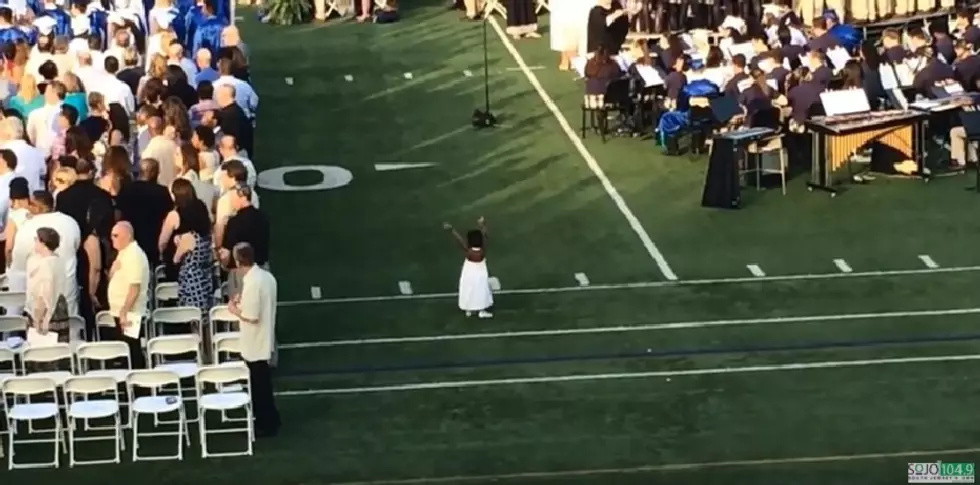 Little Girl Dances Her Way Through Local High School Graduation [VIDEO]