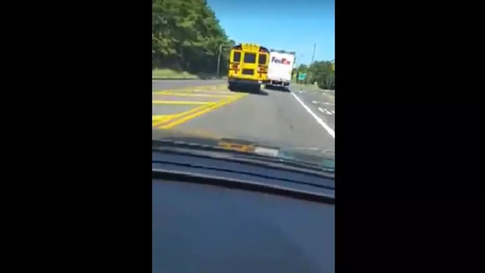 Disturbing Video Shows NJ School Bus Attempting to Take on a Tractor Trailer