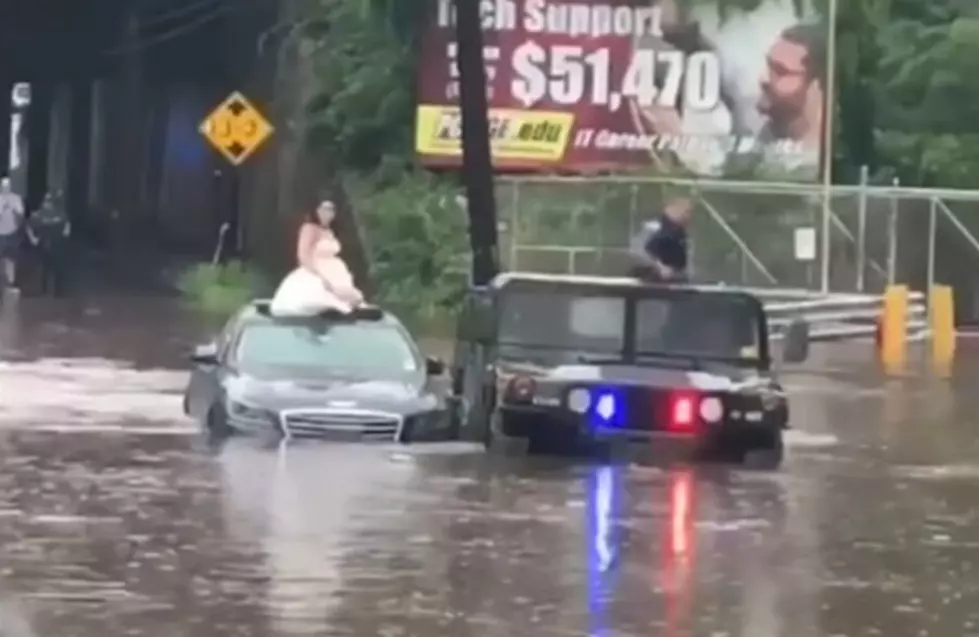 Police in New Jersey Rescue Bride and Groom from Flood Waters [VIDEO]