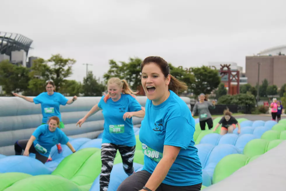 Welcome to the Madhouse! Philly Crowds Go Crazy at Insane Inflatable 5K