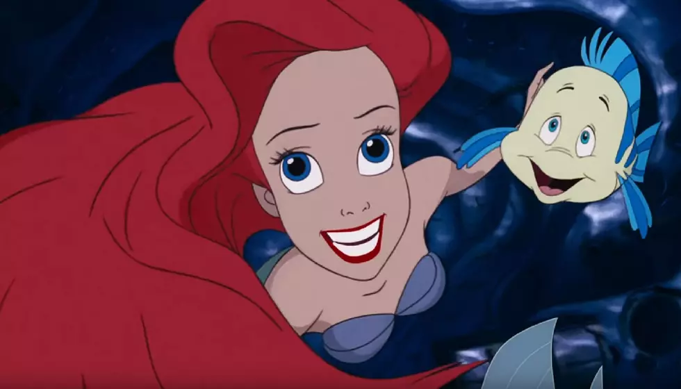The Voice of 'The Little Mermaid' Surprises S.J. Bridal Couple