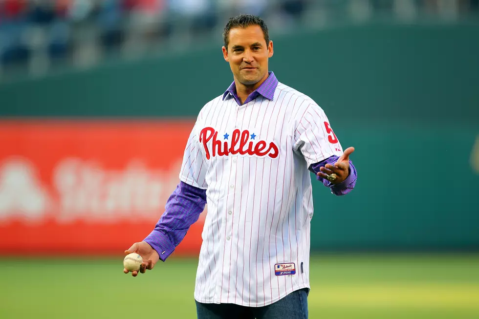 Left fielder Pat Burrell of the Philadelphia Phillies walks during News  Photo - Getty Images
