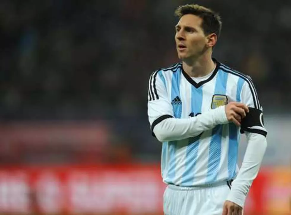 Argentina Advances, Messi Scores Two in Win