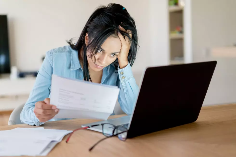 Lady Frustrated Paying Bills