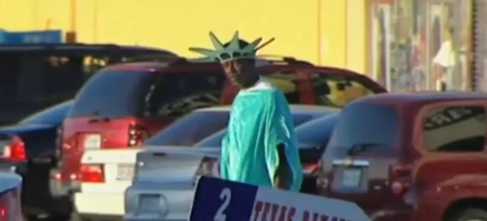 Police Officer Uses Taser on Tax Service Promoter Dressed as Statue of Liberty [VIDEO]