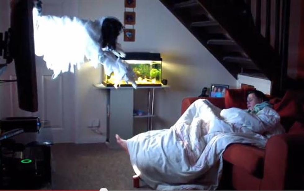 Watch This Guy Freak Out His Girlfriend With an Evil Puppet Coming Out of the TV [VIDEO]