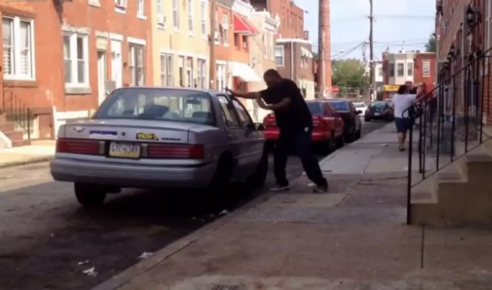 This Guy Picks a Fight With a Parked Car and Knocks Himself Out [VIDEO]