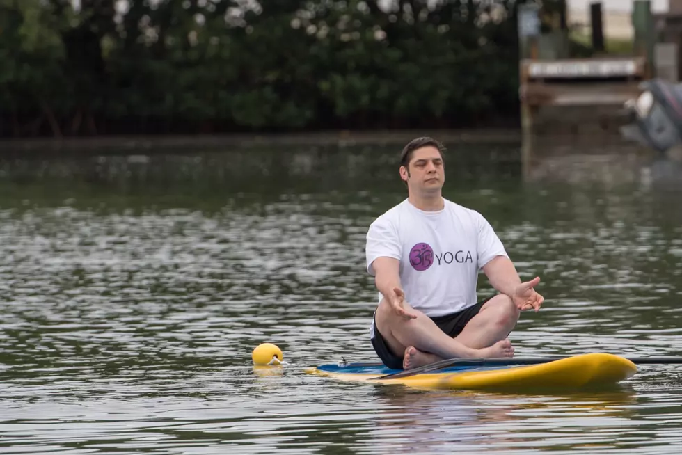 Take A Stand Up Paddle Board Yoga Class with 315 Yoga