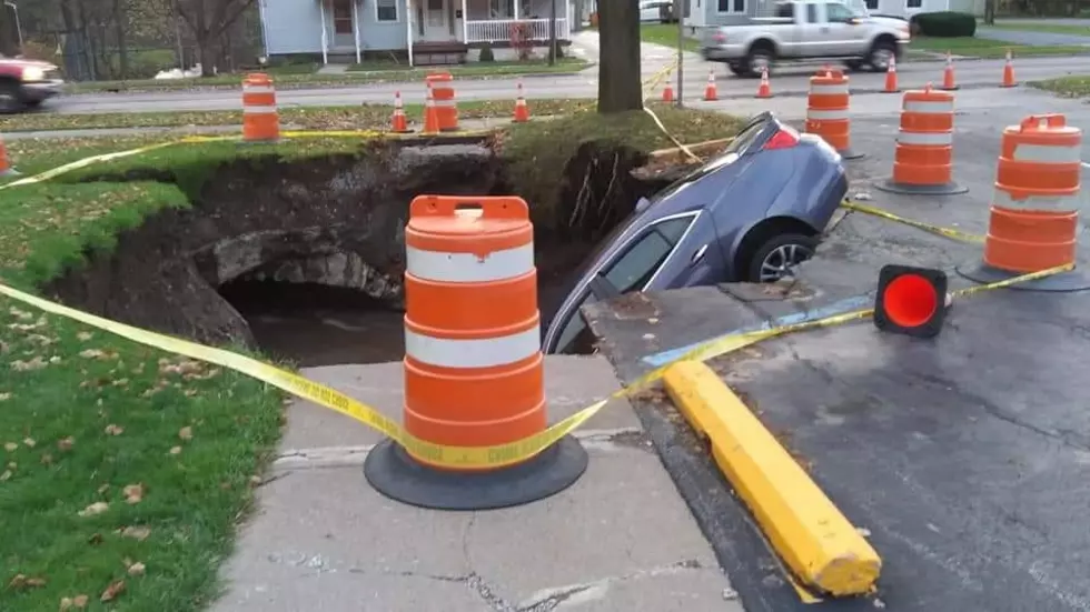 See Incredible Photos as Sinkhole Swallows Car in Waterville
